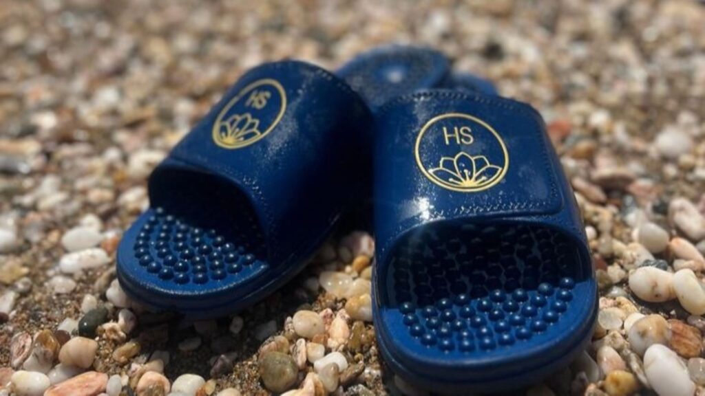 Navy Sliders on the beach. perfect post swim and after all sports for a relaxing reflexology massage