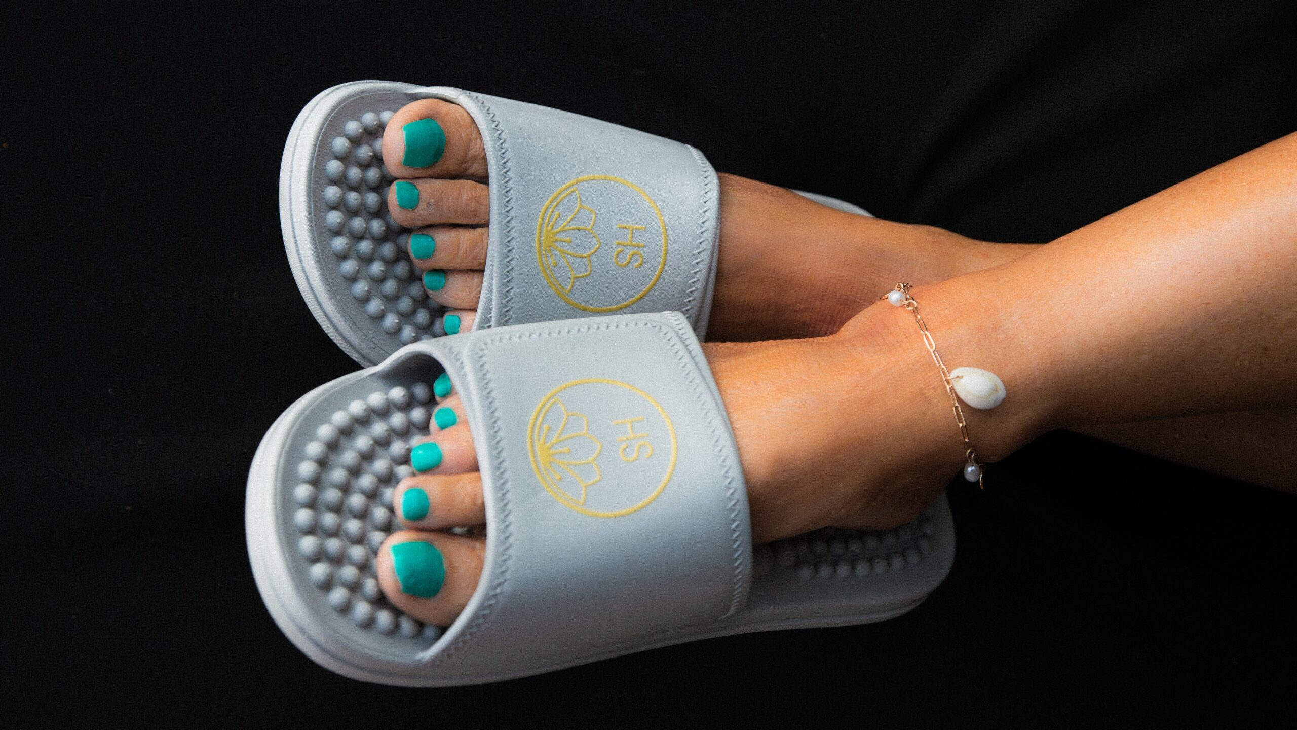 Silver Massaging Sliders. Lightweight and on trend wellness footwear.