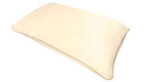 A flat image of the Holistic Silk Pillowcase in Cream colour Mulberry Silk laid diagonally across the shot showing the honey coloured piping.