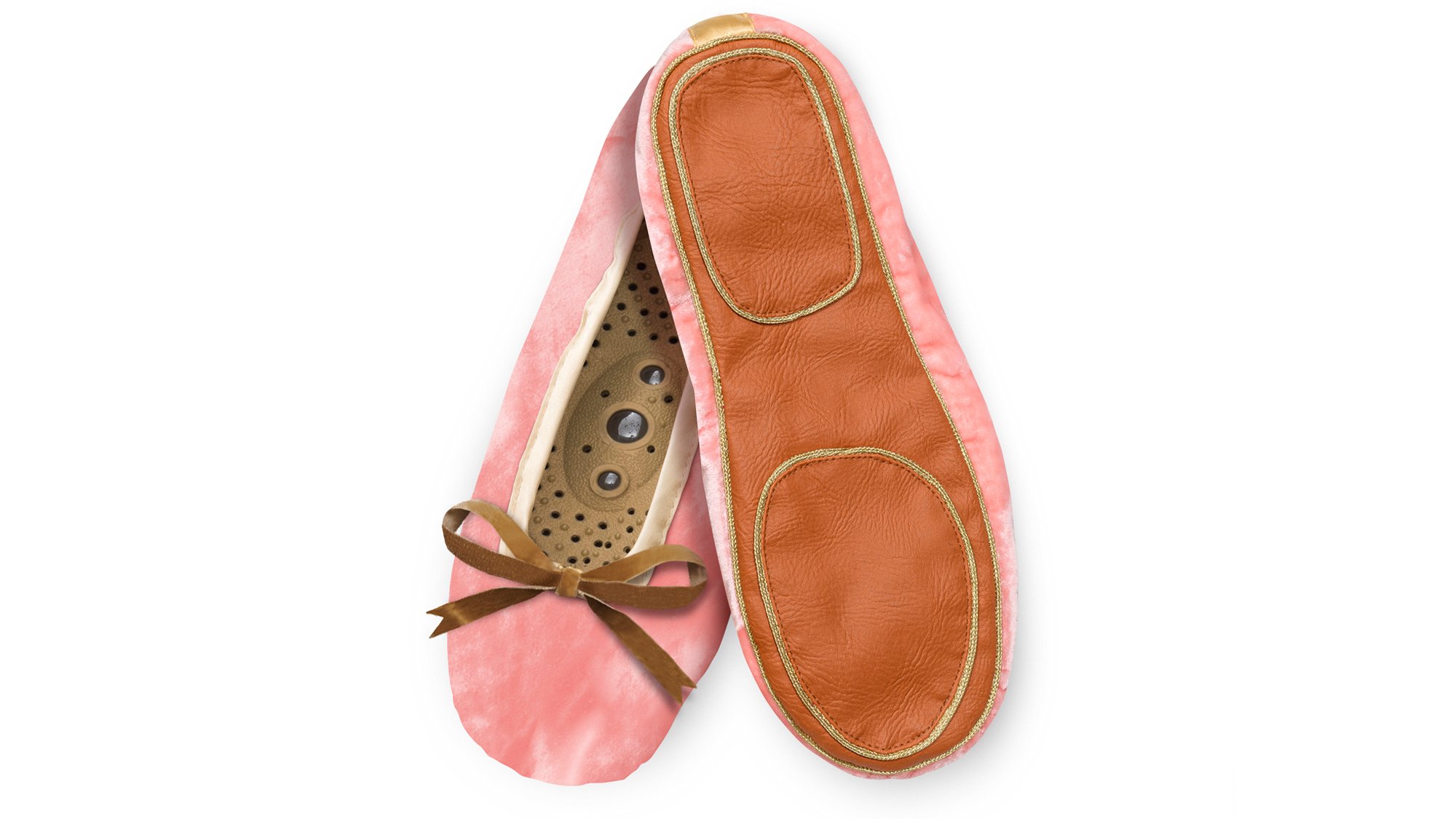 A flat image of a pair of Holistic Silk ballerina style Massaging Slippers in a Rose Silk Velvet colour with a honey colour velvet bow tie at the top edge of the toe area. The slippers are crossed at the heel showing the magentic insoles inside the left slipper and the sole of the rigth sleipper which is tan colour with gold braide highlighting the toe and heel areas. .