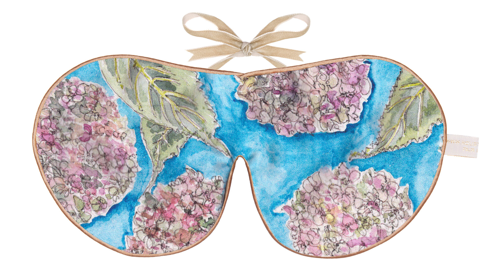 Flat image of the Holistic Silk Excluisve Silk Sleep Mask with a watercolour effect hand drawn Hydrangea Flower design with Honey colour piping and a Honey colour velvet bow above it on a clear white background.