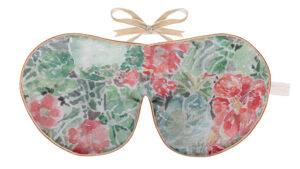 Flat image of the Holistic Silk Excluisve Silk Sleep Mask with a watercolour effect Nasturium design with Honey colour piping and a Honey colour velvet bow above it on a clear white background.