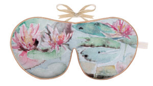Flat image of the Holistic Silk Excluisve Silk Sleep Mask with a watercolour effect Water Liliy design with Honey colour piping and a Honey colour velvet bow above it on a clear white background.