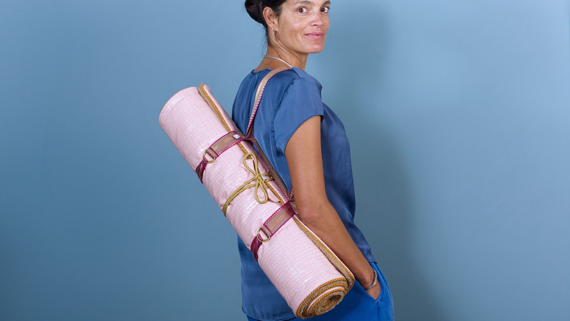 Holistic Silk Yoga Rug Mat showing carrying harness