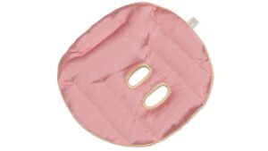 Flat image of the Holistic Silk Face Pillow, designed to dissolve anxiety, promote deep relaxation and soothe tired skin, in a Rose colour on a clear white background.
