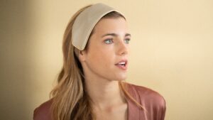 A Silk Hairband, gently shaped along one edge, the perfect hair accessory or beauty routine tool.