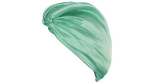 A flat profile image on a white background showing the Holistic Silk Hair Wrap in a Jade Mulberry Silk. The wrap is shaped like a turban with the rear facing to the right. It features a twist knot at the top and shows the silk material in a flowing manner.
