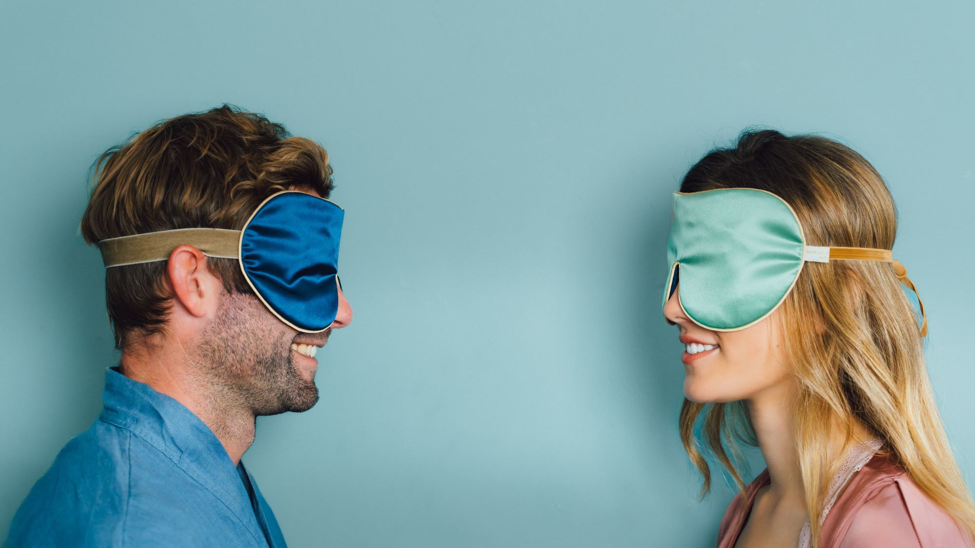 Jade and Navy Classic Silk Eye Mask being worn