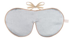 Flat image of the Holistic Silk Classic Silk Sleep Mask in a Silver colour with Honey colour piping and a Honey colour velvet bow above it on a clear white background.