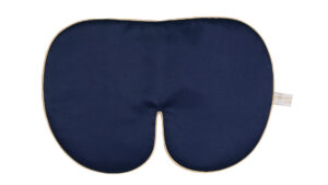 Flat image of the Holistic Silk Deluxe Silk Sleep Mask in a Navy colour with Honey colour piping on a clear white background.