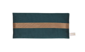 Emerald silk eye pillow with honey-coloured band on a white background